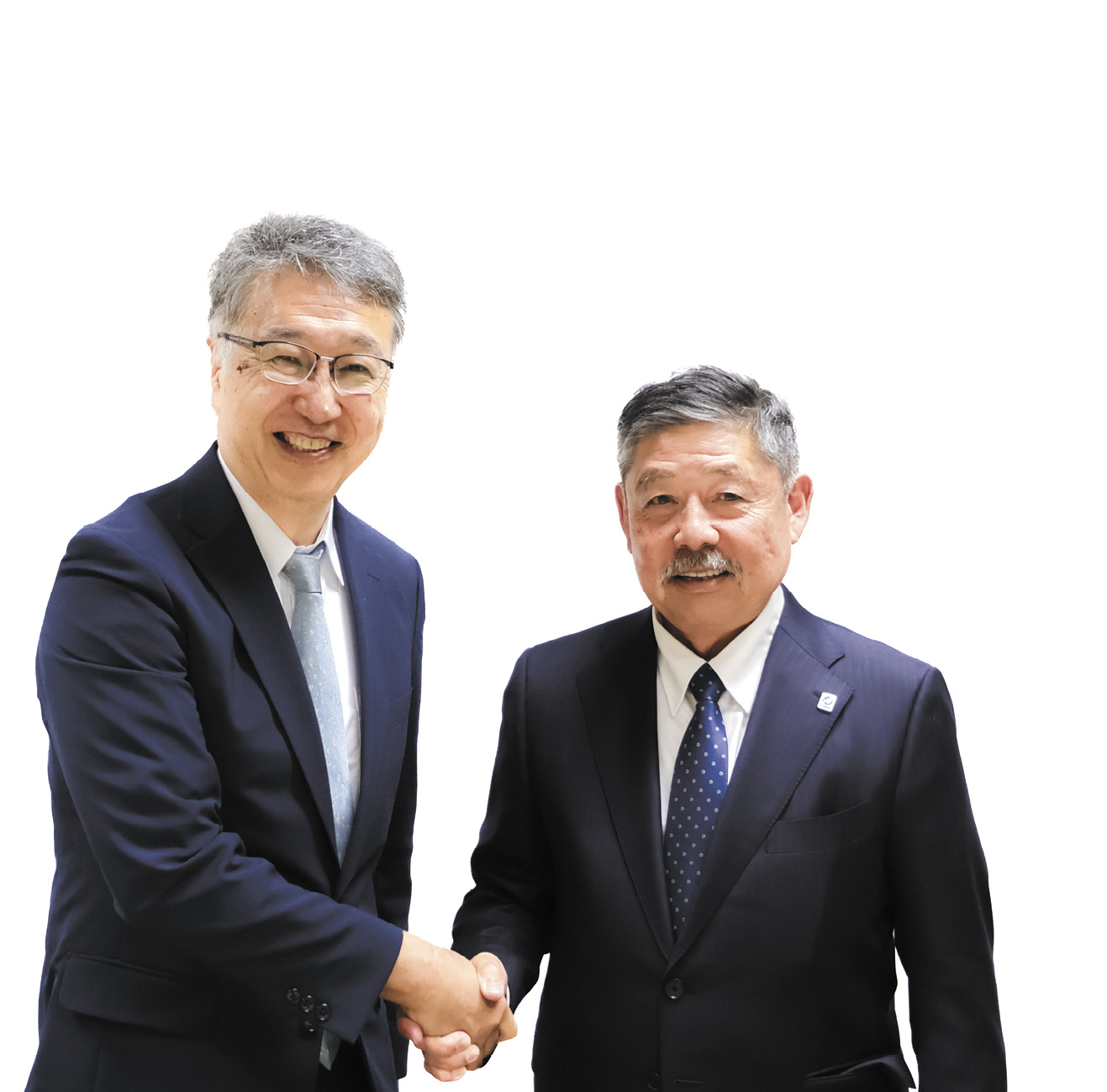 握手する中須賀真一氏と中島英治氏