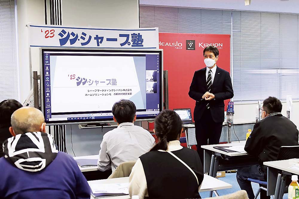 冒頭であいさつする米谷氏