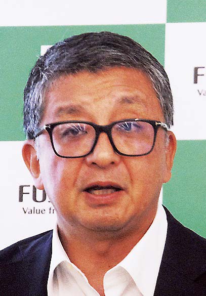 新サービスの説明をする松本社長