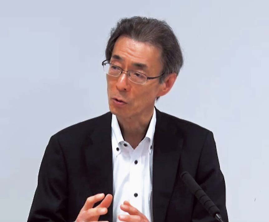 説明する貝原委員長