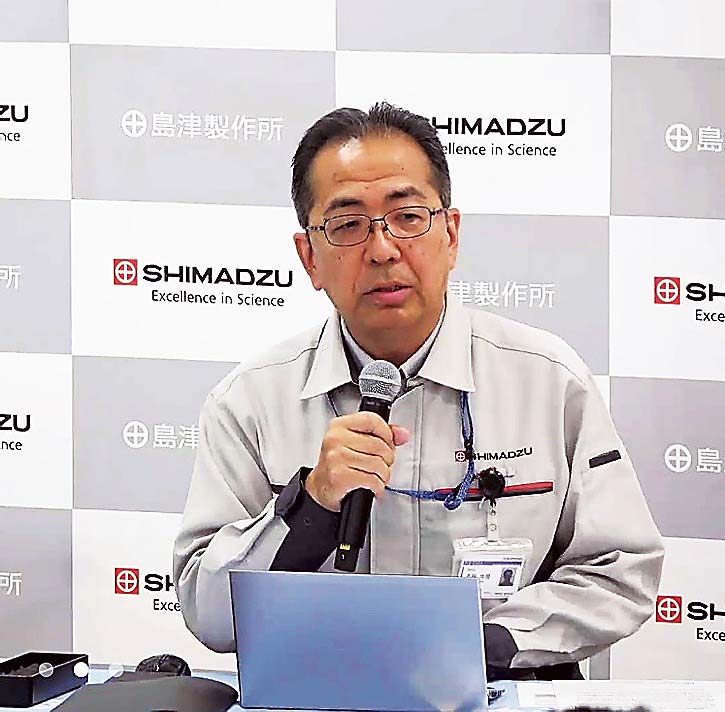 説明する吉岡部長