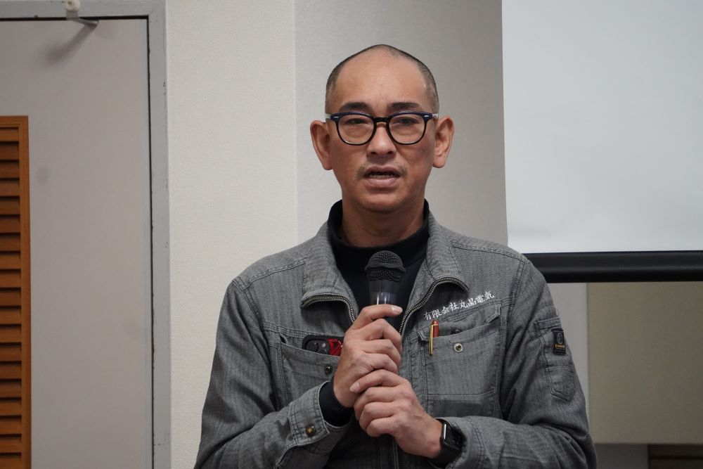 あいさつする大北地方代表理事