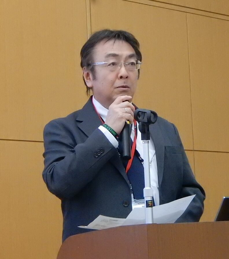 イベントの意義を説明する田中副会長