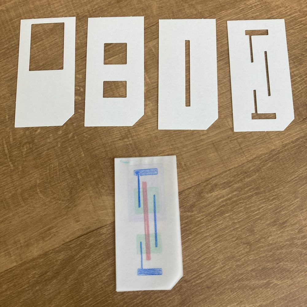 塗り絵でICチップの仕組みを学べる(下段が完成品)