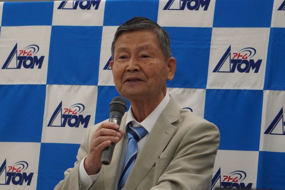 講演する井坂相談役